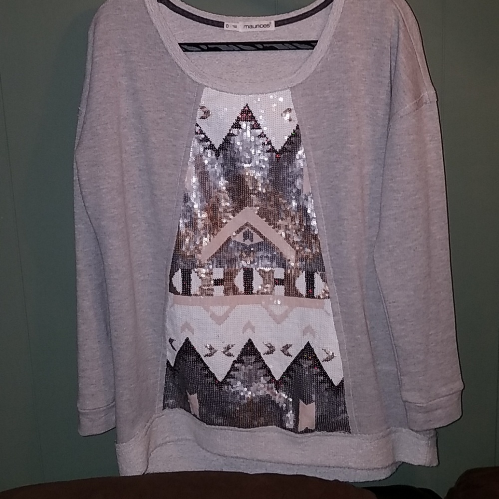 Maurice's sweater.